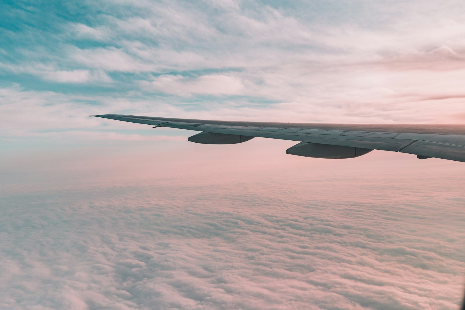 Flying plane above sky white plane wing