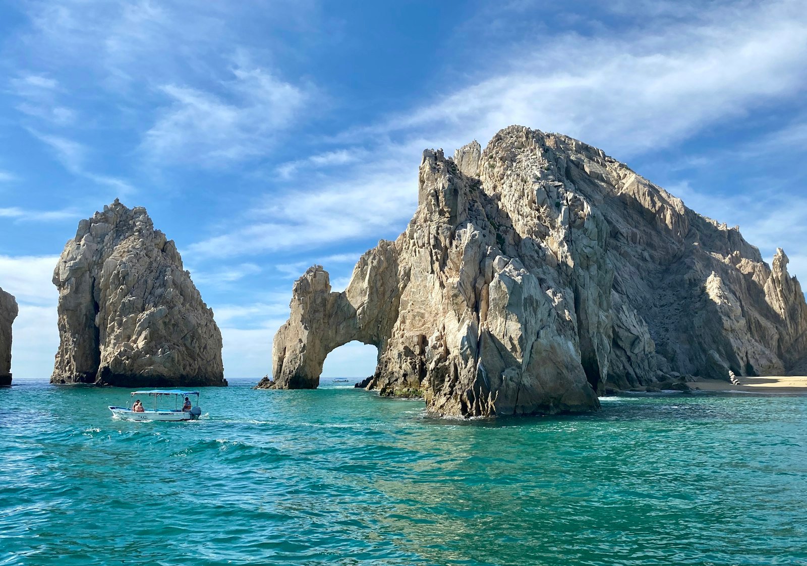 Brown rock formation on sea under blue sky during daytime, Arch of Cabo San Lucas, Cabo San Lucas, Baja California Sur, Mexico