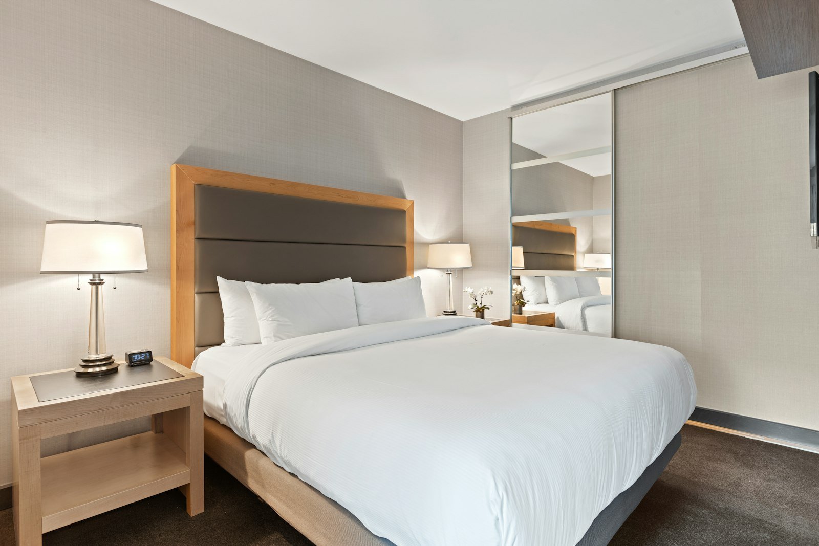 White bed linen on bed