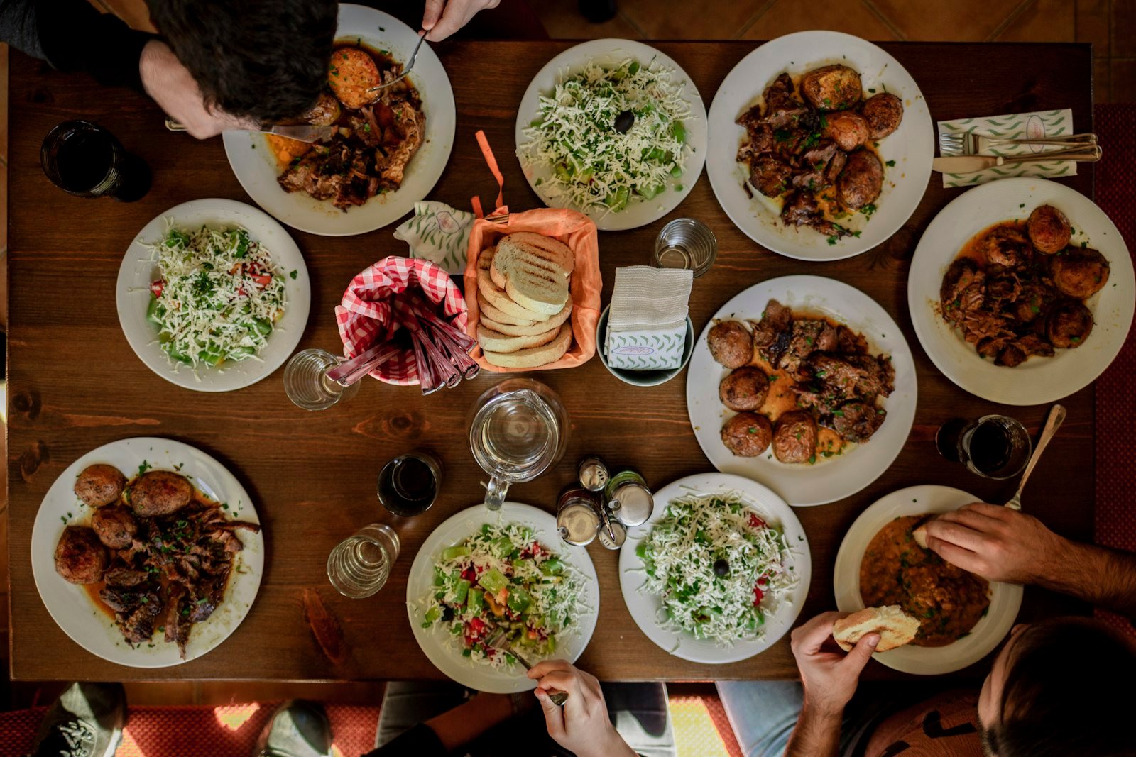 White plates with assorted foods, Mechi Chal, Rhodope Mountain, Bulgaria
