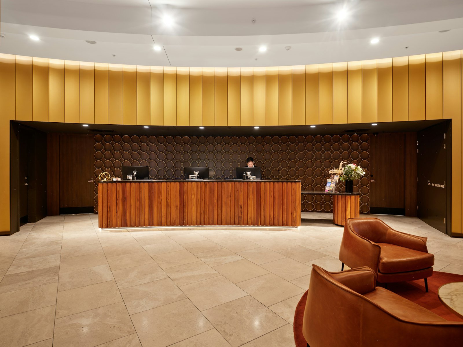 Hotel reception desk with modern wooden furniture