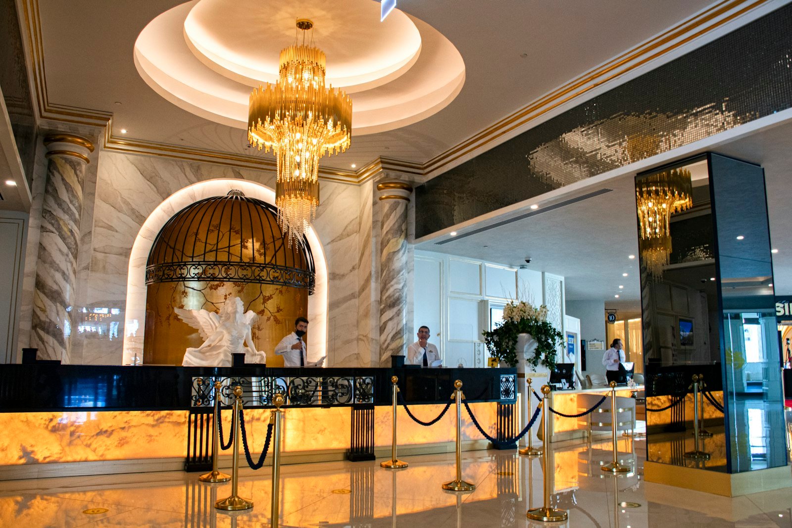 Gold chandelier on white ceiling, Limak Cyprus Deluxe Hotel, Bafra