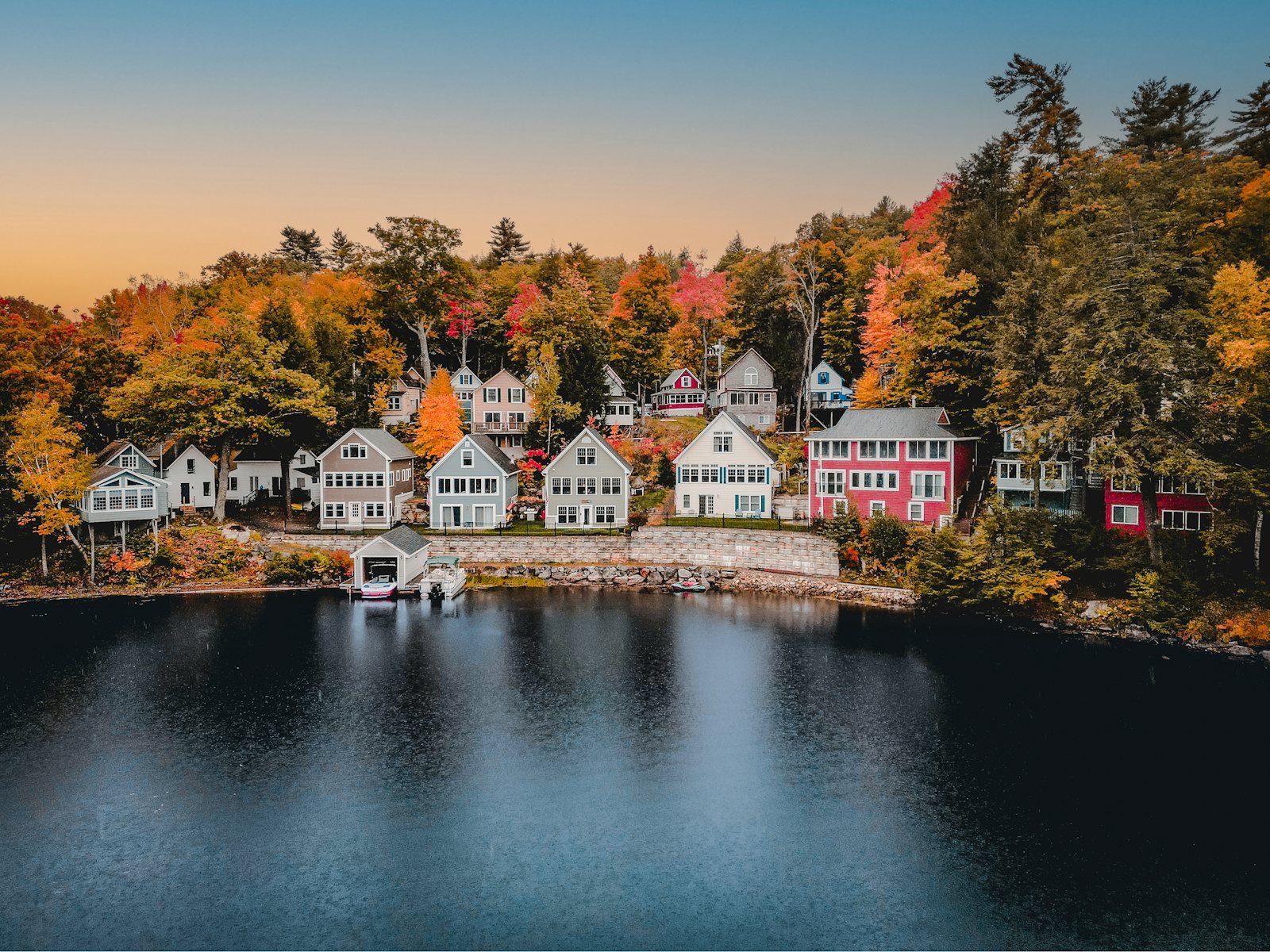 A group of houses next to a body of water, Alton Bay, Alton, NH, USA