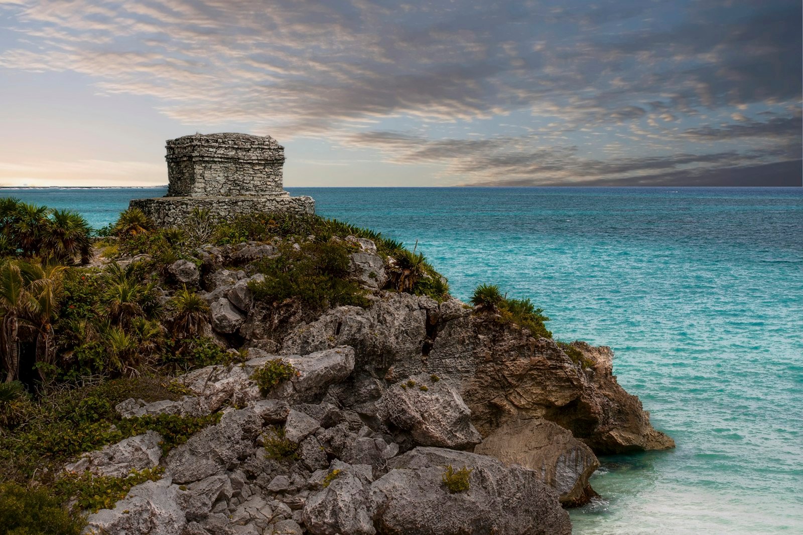 Gray rock formation near body of water during daytime, Tulum Beach, Quintana Roo, Mexico